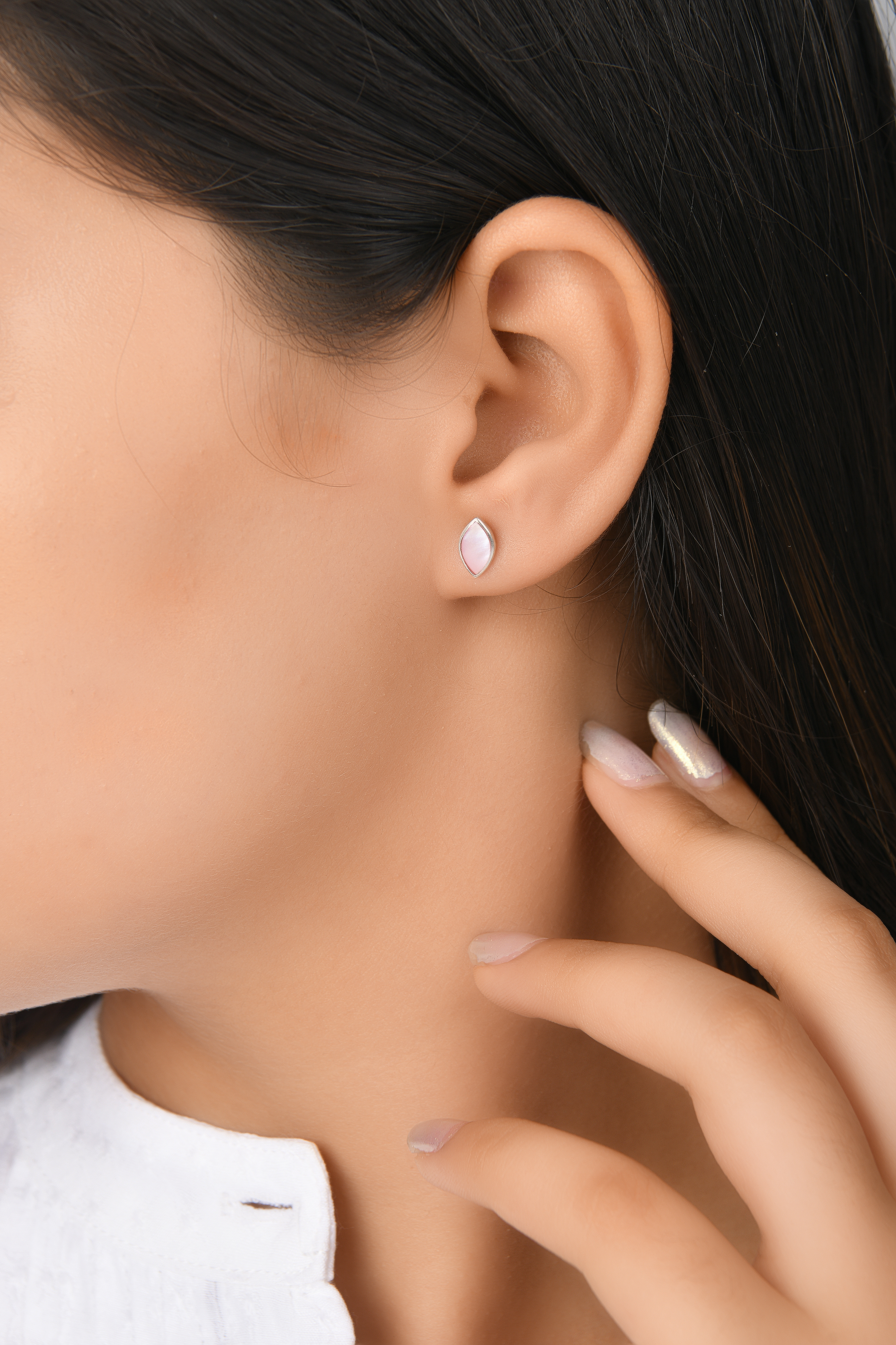 Elegant Stud Earrings Featuring A Soft Pink Gemstone